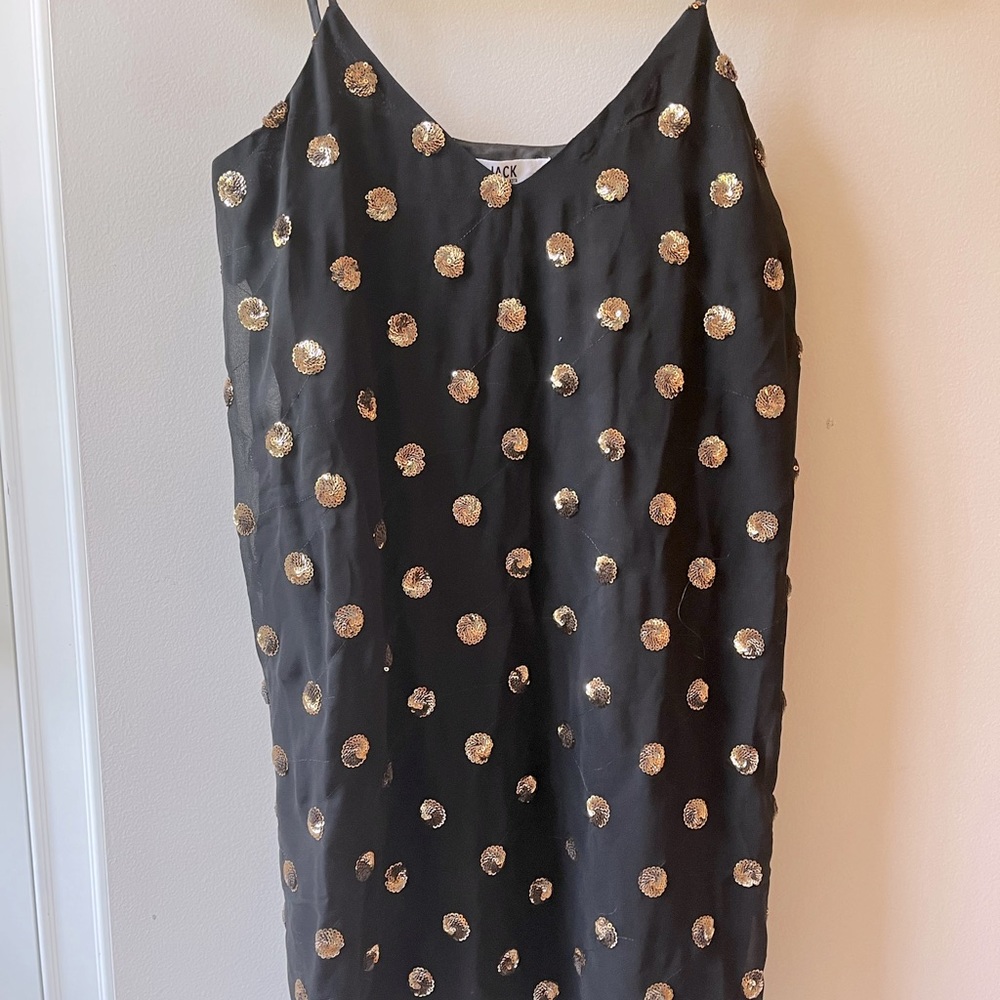 Black mini dress with gold glitter polka dots